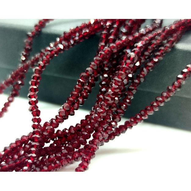 Stiklinis karoliukas rondelė facetuotas skaidrus t. rubino sp.(13) 3x2mm, juosta