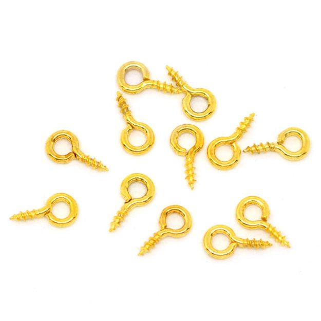 Pakabuko laikiklis-kilputė įklijuojamas aukso sp. 8x4mm <b>10vnt</b>