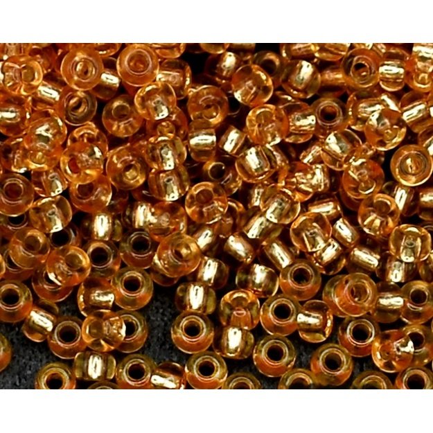 Čekiškas biseris skaidrus topazo sp. šerdim(68283) 10/0 50g